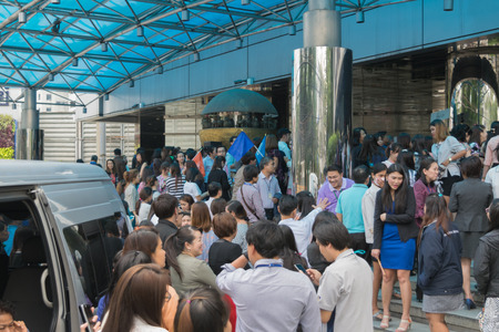 Bangkok, Thailand - November 20, 2015 : Many working people preparedness for fire drill or other disaster at office in Bangkok Thailandのeditorial素材