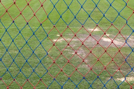 Net of goal and grass football fild