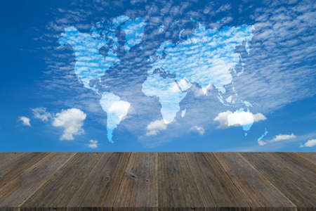 Nature cloudscape with blue sky and white cloud with Wood terrace and world map