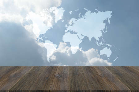 Nature cloudscape with blue sky and white cloud with Wood terrace and world mapの写真素材