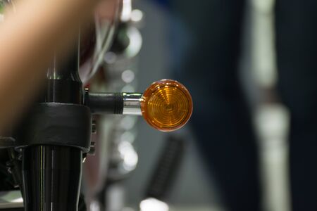 Zoom at motorcycle taillight in Car show event at Bangkok, Thailand. This a open event no need...