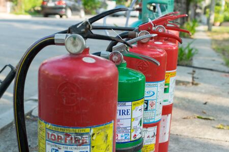 Bangkok, Thailand - January 31, 2016 : Many people preparedness for fire drill and training to use a fire safety tank in village at Bangkok Thailand.のeditorial素材
