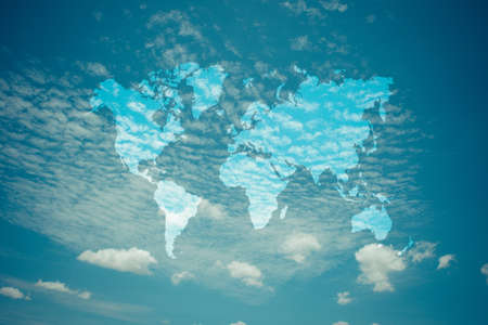 Nature cloudscape with blue sky and white cloud with world map , process in vintage styleの写真素材
