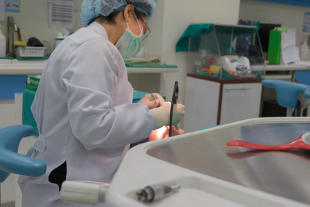 Bangkok, Thailand - September 17, 2016 : Unidentified dentist working for heal dental patients at a clinic.のeditorial素材
