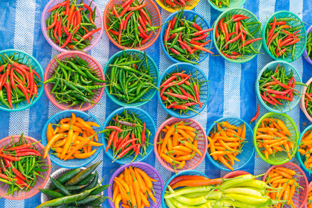 Thai exotic food in street food market with chilli. Like the charming people, exotic foods greets you on almost every corner in Thailand.の写真素材