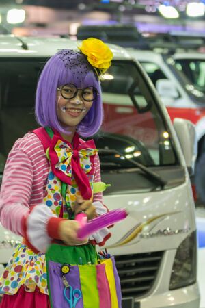 Bangkok, Thailand - December 10, 2015 : Unidentified model pretty lady on display in car show event. This a open event no need press credentials required.のeditorial素材