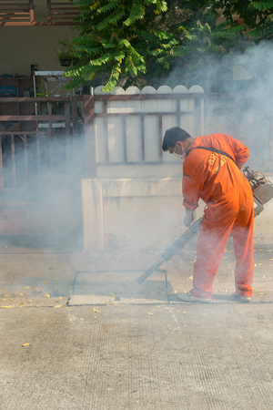 Bangkok, Thailand - January 31, 2016 : Unidentified people fogging DDT spray kill mosquito for control Malaria, Encephalitis, Dengue and Zika in village at Bangkok Thailand.のeditorial素材
