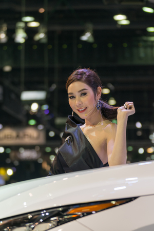 Bangkok, Thailand - December 10, 2015 : Unidentified model pretty lady on display in car show event. This a open event no need press credentials required.のeditorial素材