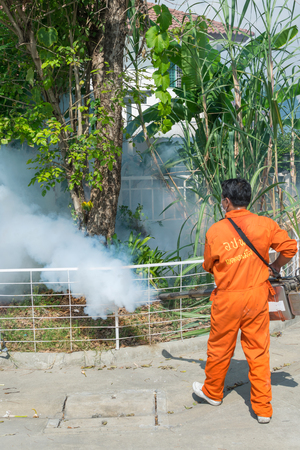 Bangkok, Thailand - January 31, 2016 : Unidentified people fogging DDT spray kill mosquito for control Malaria, Encephalitis, Dengue and Zika in village at Bangkok Thailand.のeditorial素材