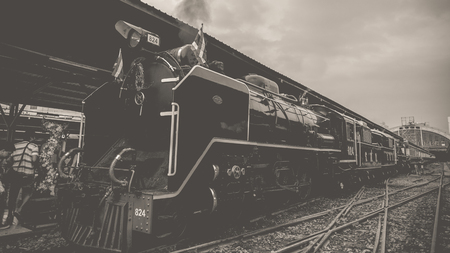 Bangkok, Thailand - March 26, 2016 : Steam train at Foundation Day of train operation 119 years anniversary of the State Railway of Thailand. , process in vintage black and white styleのeditorial素材