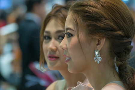 Bangkok, Thailand - December 10, 2015 : Unidentified model pretty lady on display in car show event. This a open event no need press credentials required.のeditorial素材