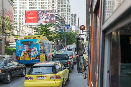 Bangkok, Thailand - March 15, 2016 : Traffic jam in rush hour view from bus in Bangkok. Buses are...
