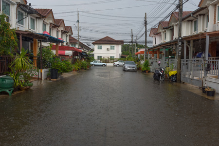 Bangkok, Thailand - May 15, 2016 : Water flood village in Don Mueang district. Problem with the drainage system.のeditorial素材