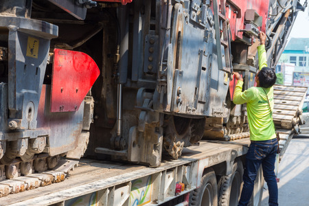 Ang Thong, Thailand - May 2, 2016 : Sugar cane harvesters on trailer truck for move to work.のeditorial素材