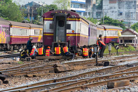 Bangkok, Thailand - April 26, 2016 : Unidentified railway employees working for restoration the...