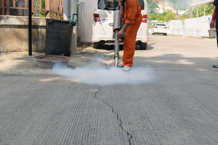 Bangkok, Thailand - January 31, 2016 : Unidentified people fogging DDT spray kill mosquito for control Malaria, Encephalitis, Dengue and Zika in village at Bangkok Thailand.のeditorial素材