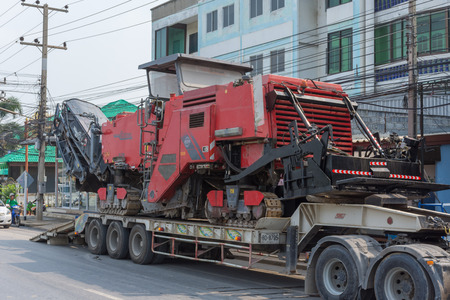 Ang Thong, Thailand - May 2, 2016 : Sugar cane harvesters on trailer truck for move to work.