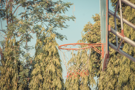 Basketball hoop make by wooden and ball in park , process in vintage styleの写真素材