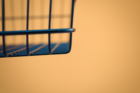 Minimalism style, Shopping cart black color and yellow wall at supermarket. , process in vintage styleの写真素材