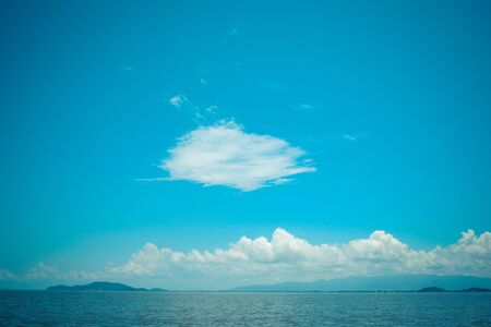 Beach and tropical sea with blue skyの写真素材
