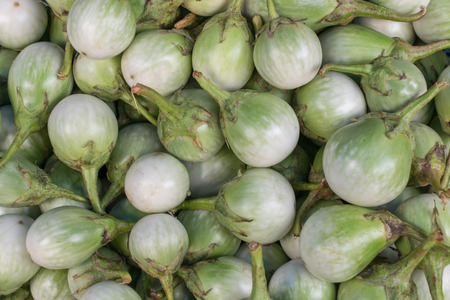 Green eggplant or Brinjal at vegetable market in Thailandの写真素材