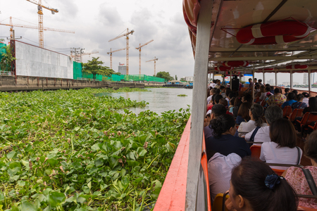 Bangkok, Thailand - August 28, 2016 : Boat driver service for Tourist the popular boat travel on the Chao Phraya river. To stay in downtown Bangkok. And tourist attractions on both sides of the river.のeditorial素材