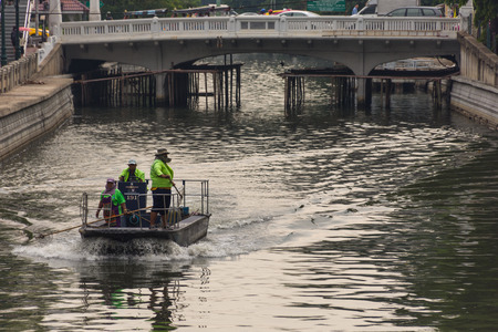 Bangkok, Thailand - May 16, 2016 : Garbage collection boat working in Khlong Phadung Krungkasem is a important canal in downtown Bangkok, Thailand.のeditorial素材
