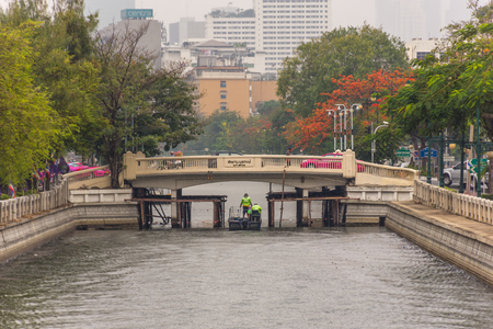 Bangkok, Thailand - May 16, 2016 : Garbage collection boat working in Khlong Phadung Krungkasem is a important canal in downtown Bangkok, Thailand.のeditorial素材