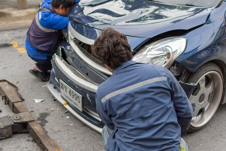 Bangkok, Thailand - June 17, 2016 : Car crash from car accident on the road in a city between saloon versus pickup wait insurance.のeditorial素材