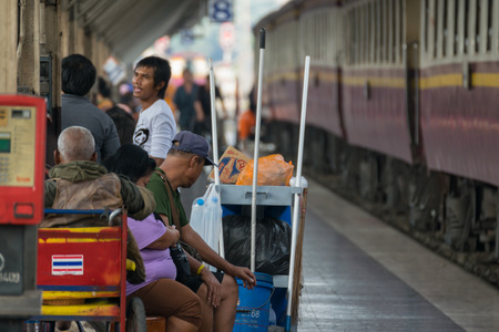 Bangkok, Thailand - February 2, 2016 : Unidentified railway train on the railroad tracks in Bangkok station. Many people in Thailand popular travel by train because it is cheaper.のeditorial素材