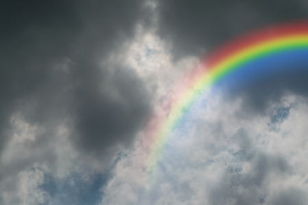 Nature cloudscape with blue sky and white cloud with rainbowの写真素材