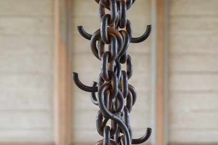 Steel chain pulley with rusty and vintage style in factory