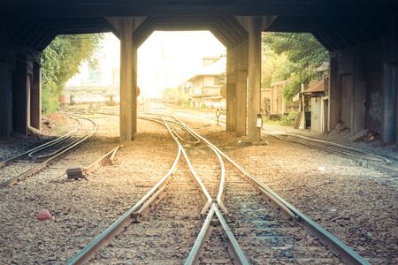 Railroad tracks crossing of a Public Thai Train Railway , process in vintage styleの写真素材
