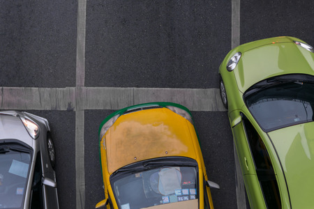 Car wait to go at intersection with traffic light on a road.の写真素材