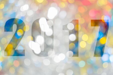 Happy New Year 2017 in Abstract bokeh background of light for celebration new year and christmas