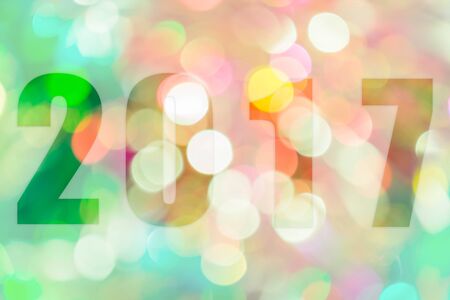 Happy New Year 2017 in Abstract bokeh background of light for celebration new year and christmas