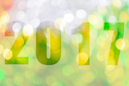Happy New Year 2017 in Abstract bokeh background of light for celebration new year and christmas