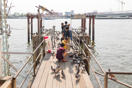 Bangkok, Thailand - March 6, 2016 : Boat port service for tourist the popular boat travel on the Chao Phraya river. To stay in downtown Bangkok. And tourist attractions on both sides of the river.のeditorial素材