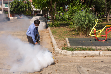 Bangkok, Thailand - November 19, 2016 : Unidentified people fogging DDT spray kill mosquito for control Malaria, Encephalitis, Dengue and Zika in village at Bangkok Thailand.のeditorial素材