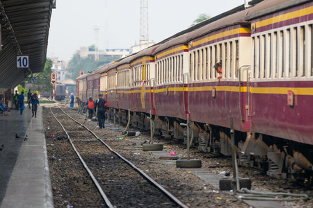 Bangkok, Thailand - February 2, 2016 : Unidentified railway train on the railroad tracks in Bangkok station. Many people in Thailand popular travel by train because it is cheaper.のeditorial素材