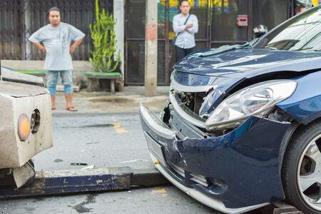 Bangkok, Thailand - June 17, 2016 : Car crash from car accident on the road in a city between saloon versus pickup wait insurance.のeditorial素材