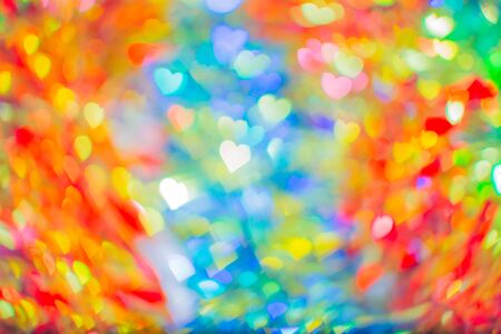 Love abstract bokeh background heart shape of light for celebration valentine's day and wedding anniversaryの写真素材