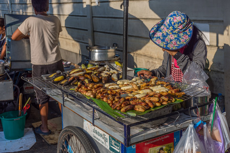 Bangkok, Thailand - April 10, 2016 : Banana grilled is a roast fresh fruit for health in Thai food market.のeditorial素材