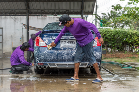 Bangkok, Thailand - January 4, 2017 : Unidentified car care staff cleaning the car (Car detailing).のeditorial素材