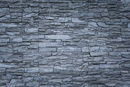 Stone wall texture background surface natural colorの写真素材