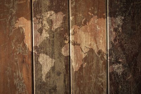 Wood texture background surface natural color , process in vintage style with world mapの写真素材