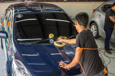 Bangkok, Thailand - March 11, 2017 : Unidentified car care staff cleaning the car (Car detailing).のeditorial素材