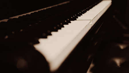 Piano keys on black classical grand piano play a classic songの写真素材