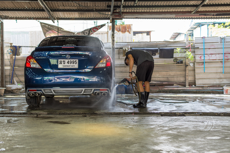 Bangkok, Thailand - March 11, 2017 : Unidentified car care staff cleaning the car (Car detailing).のeditorial素材