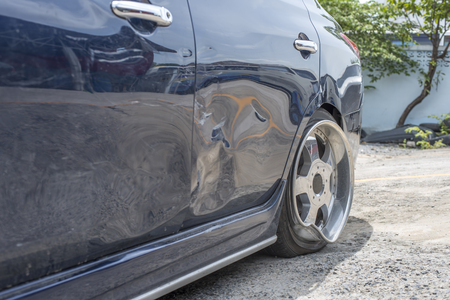 Car damaged crash from car accident on the road wait insurance in a city collision on road, accidents are a major problem of traffic in city.の写真素材